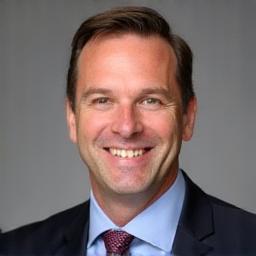 Professional headshot of Tom Walters